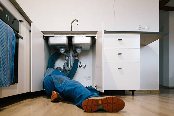 Professional Plumbing technician working in Holden, MO